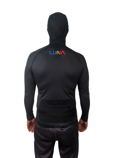A man shown from the back wearing a black hooded rash vest with a small multicolour 'LUNA' logo centred on the upper back. The background is solid black.