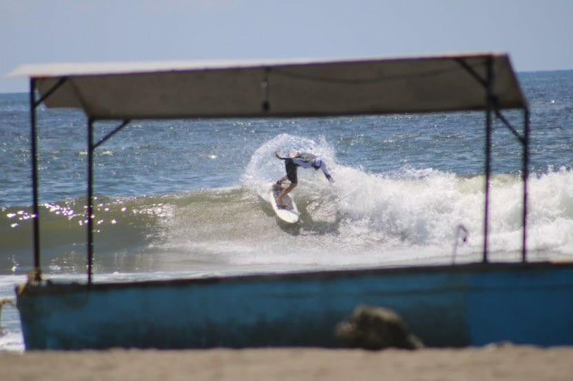 Craig Destefano Lunasurf hooded Indo Rashie hiding from the sun in Costa Rica.