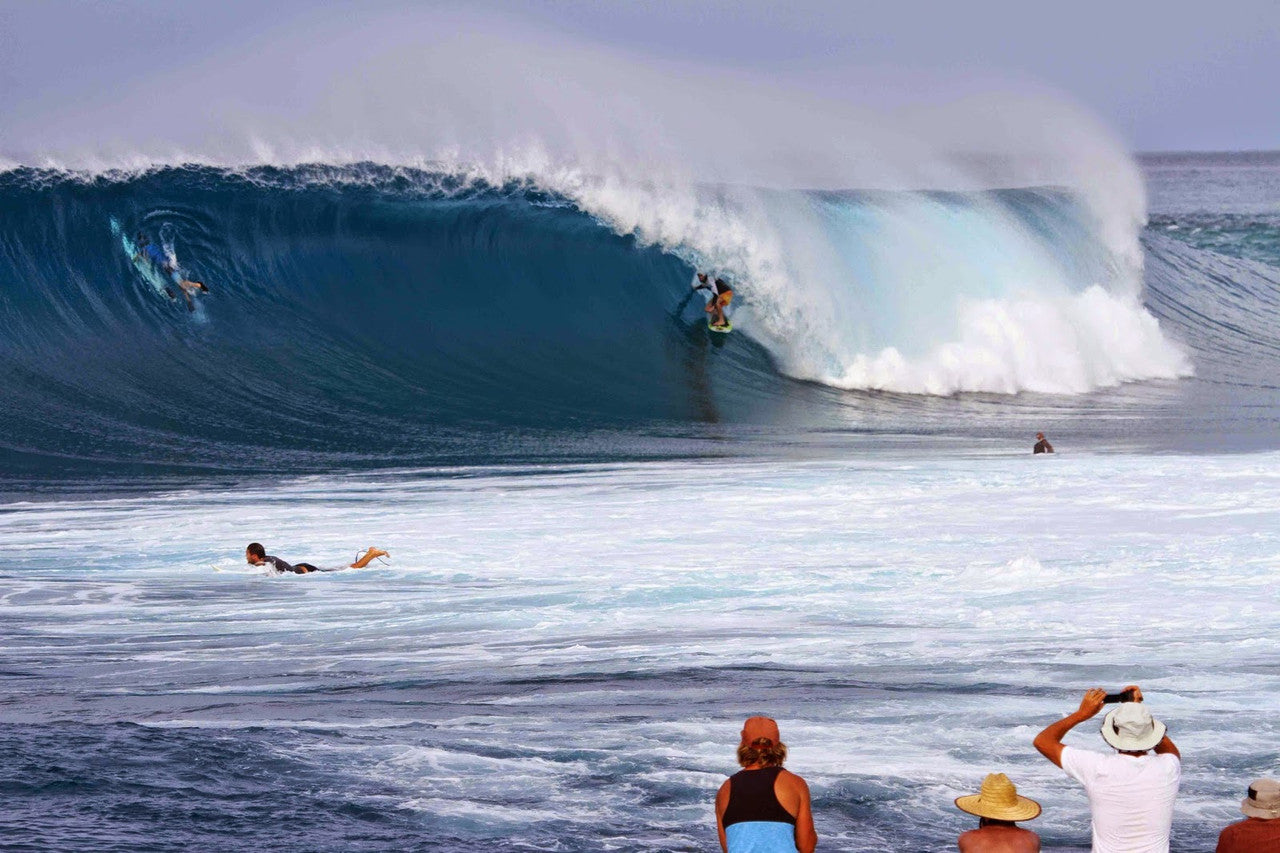 Ian Battrick in Indonesia with a Luna surf hooded long sleeve rash vest