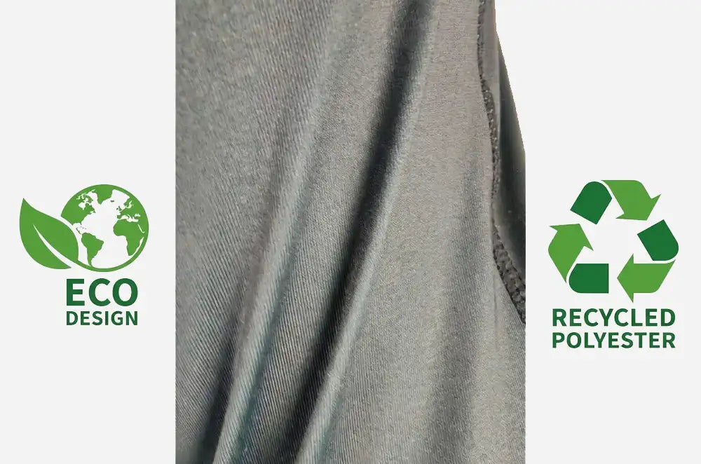A close-up of gray fabric with a vertical seam, flanked by white side panels featuring green logos that read 'ECO DESIGN' on the left and 'RECYCLED POLYESTER' on the right.