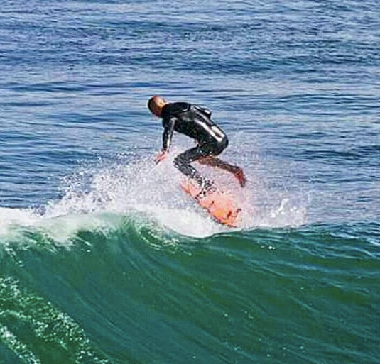 surf-kickflip-zoltan-santa-cruz-california-lunasurf-fins.png